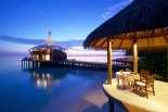 Baros Dining Over the Beach at Sunset